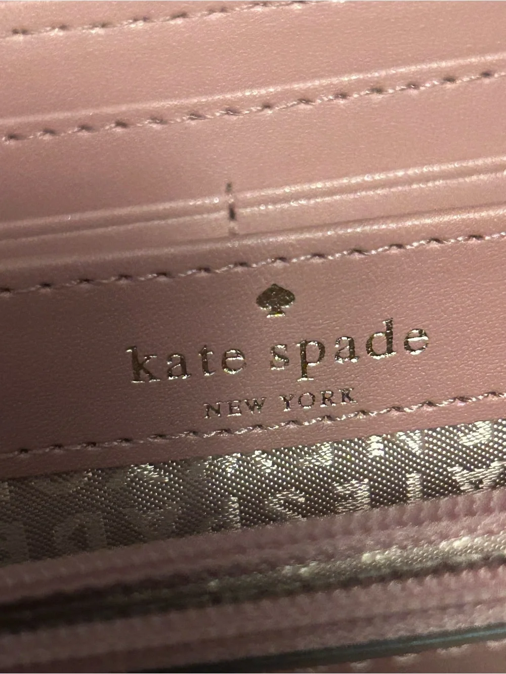 kate spade Pink Leather Zip-Around Wallet with Gold Plaque